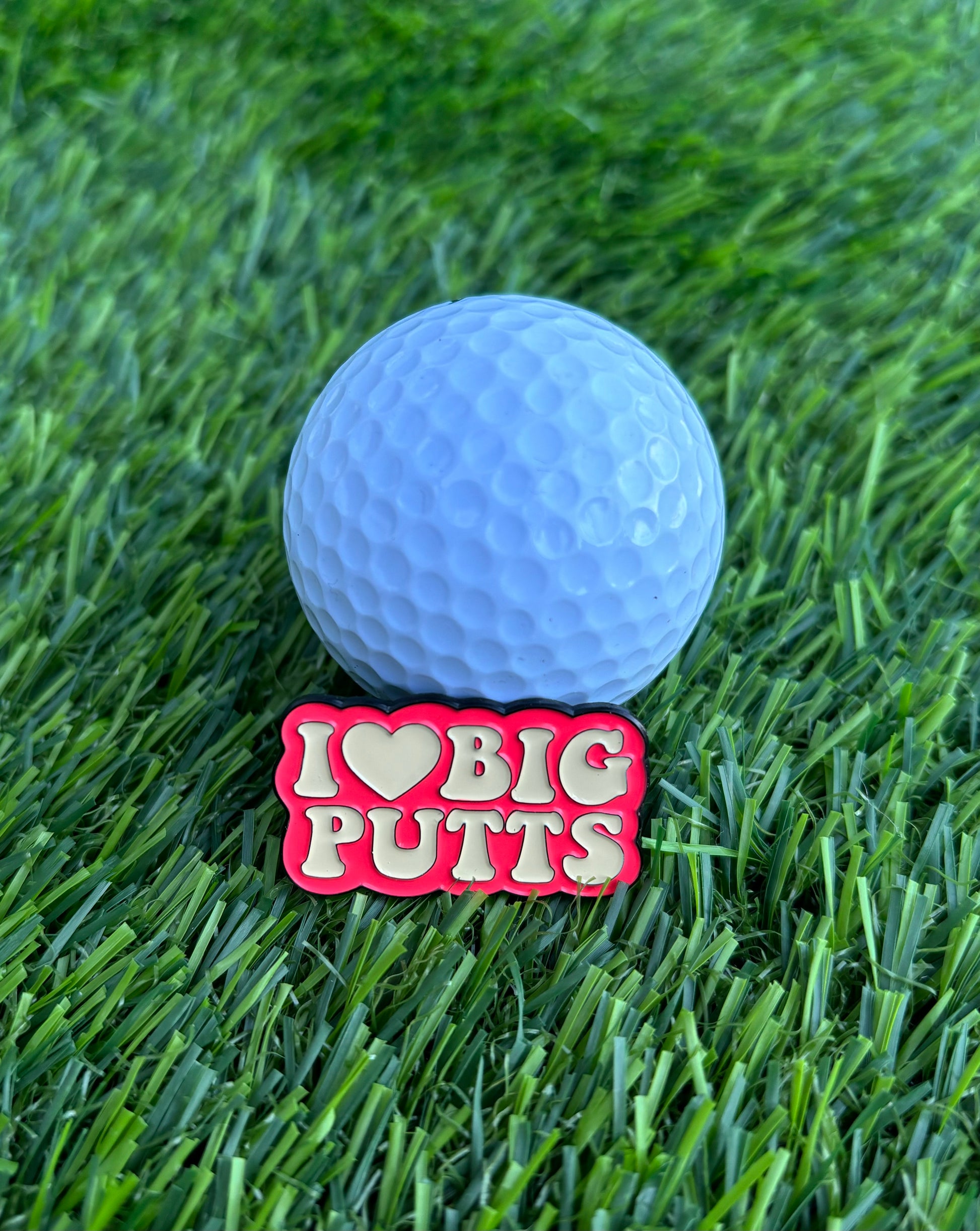 Premium golf ball markers with unique and stylish designs, crafted for durability and enhancing your golf game.