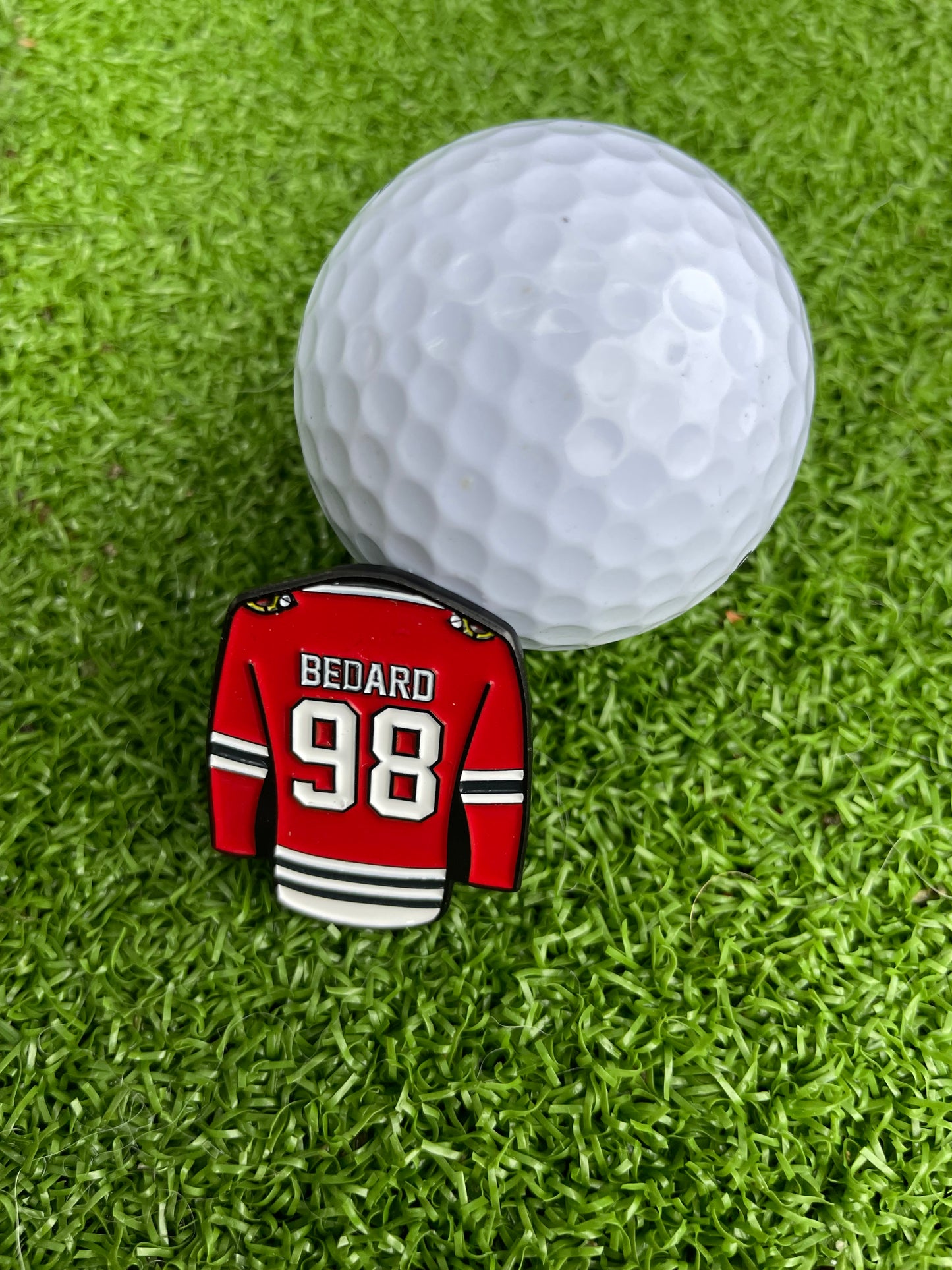 Premium golf ball markers with unique and stylish designs, crafted for durability and enhancing your golf game.