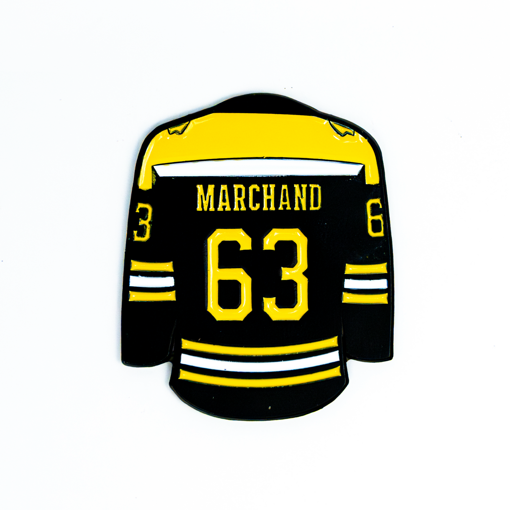 Sandybirds Golf Gear Marchand Ball Marker - Premium quality golf ball marker made of zinc alloy, designed in the shape of a Marchand jersey. A perfect accessory for golf enthusiasts looking to add a touch of style and precision to their game.