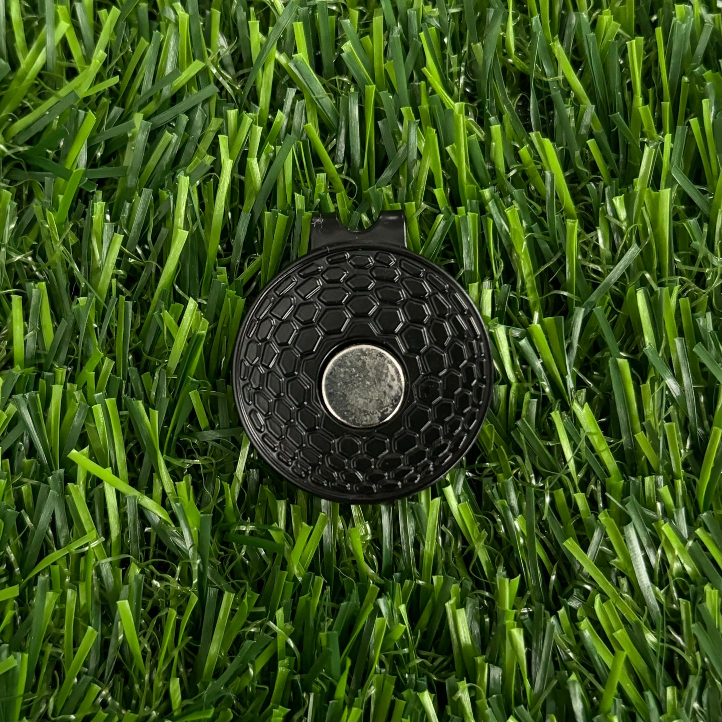 Sandybirds Golf Gear Marchand Ball Marker - Premium quality golf ball marker made of zinc alloy, designed in the shape of a Marchand jersey. A perfect accessory for golf enthusiasts looking to add a touch of style and precision to their game.