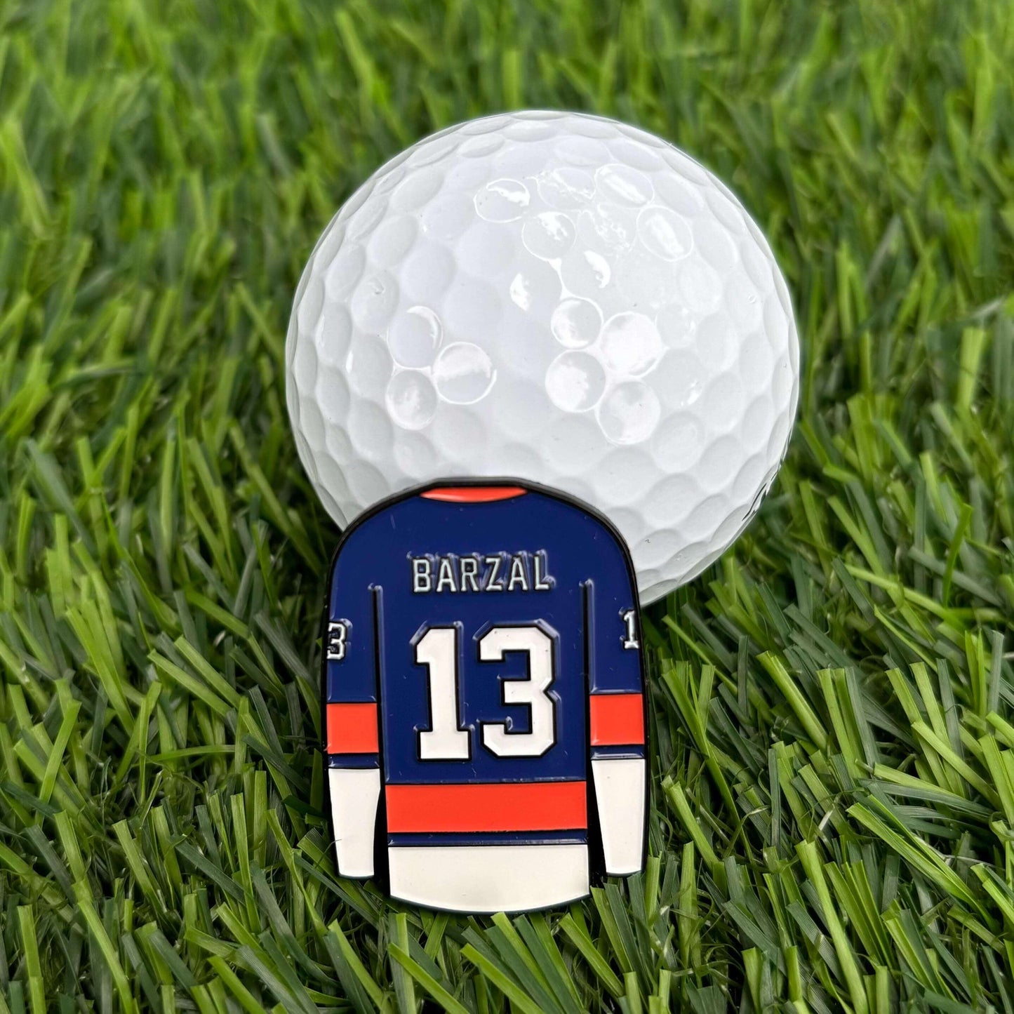 Mat Barzal golf ball marker with jersey design on grass, collectible golf accessory for golfers