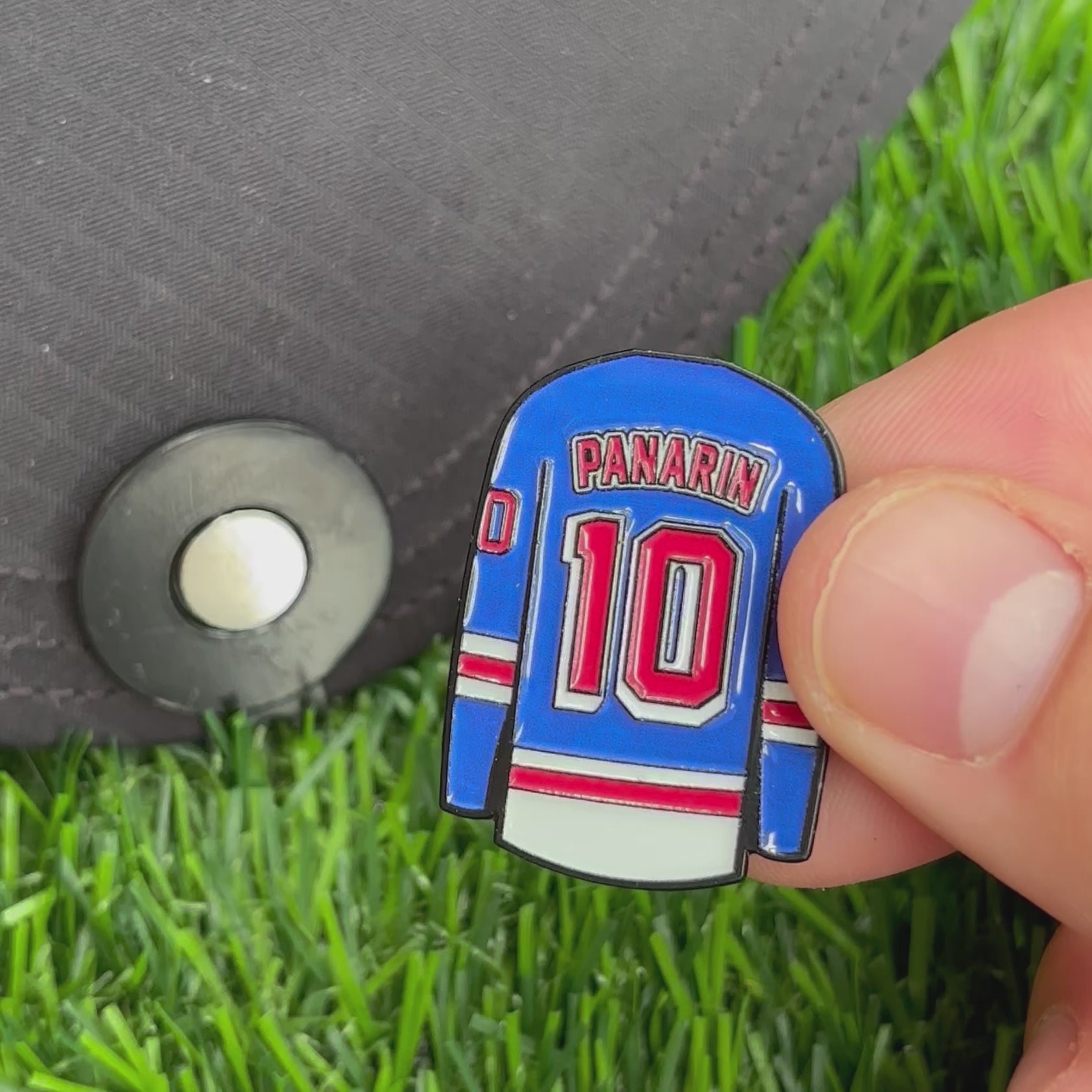 Sandybirds Golf Gear Panarin Ball Marker - Premium quality golf ball marker made of zinc alloy, designed in the shape of a Panarin jersey. A perfect accessory for golf enthusiasts looking to add a touch of style and precision to their game.