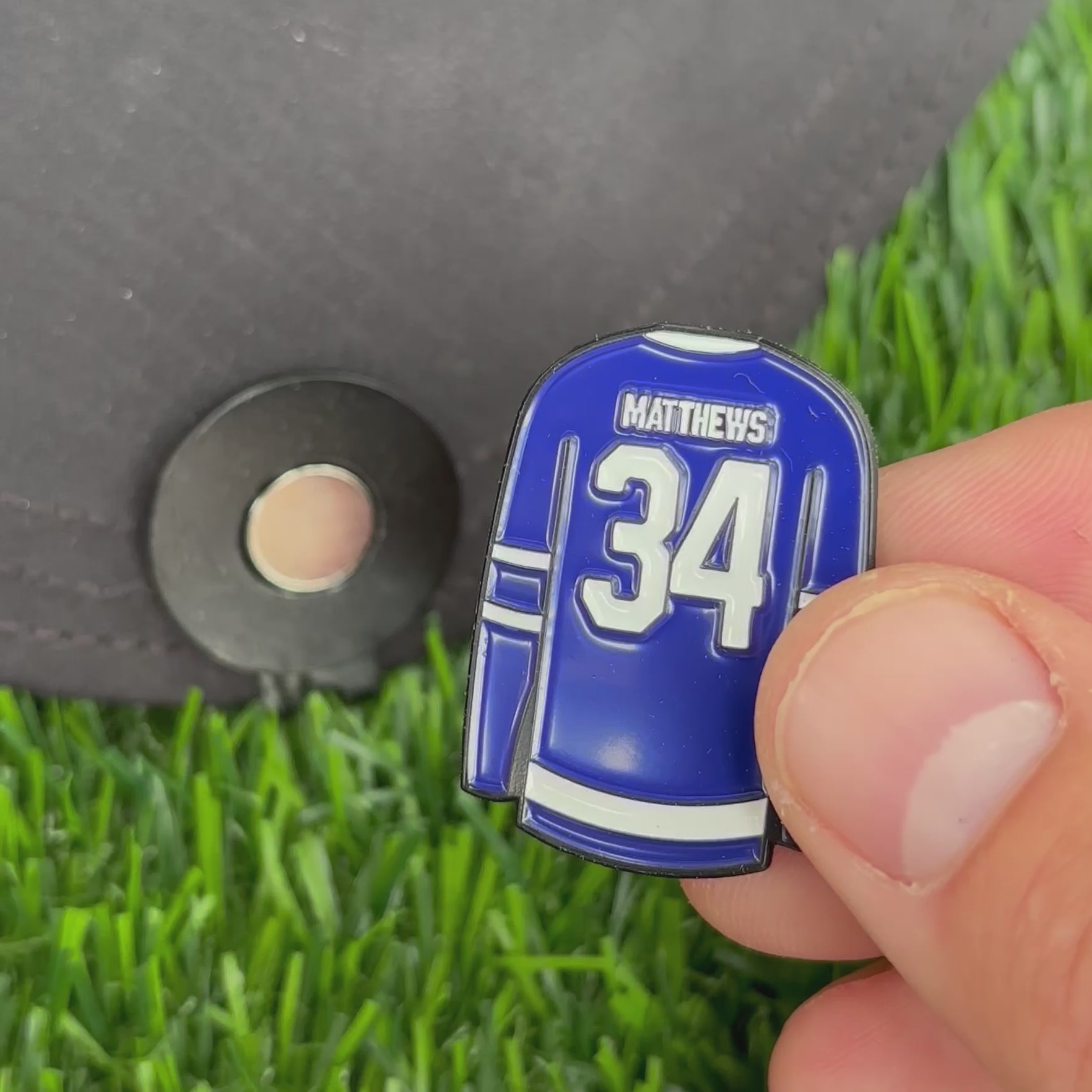 Sandybirds Golf Gear Matthews Ball Marker - Premium quality golf ball marker made of zinc alloy, designed in the shape of a Matthews jersey. A perfect accessory for golf enthusiasts looking to add a touch of style and precision to their game.