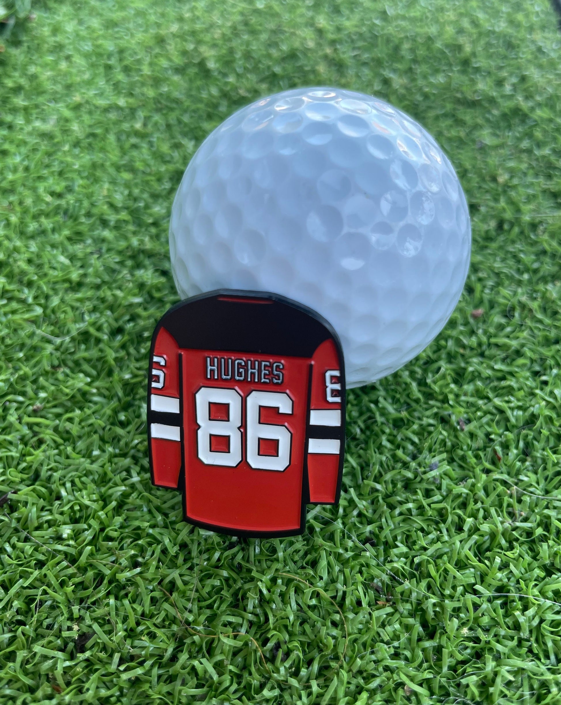 Premium golf ball markers with unique and stylish designs, crafted for durability and enhancing your golf game.