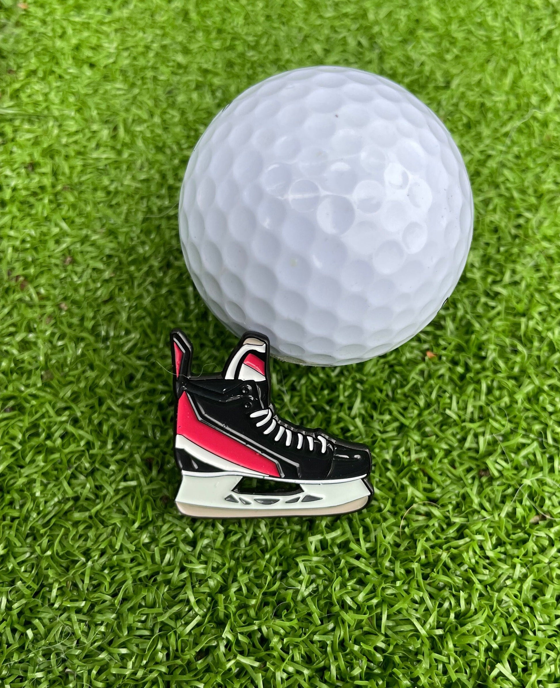 Premium golf ball markers with unique and stylish designs, crafted for durability and enhancing your golf game.